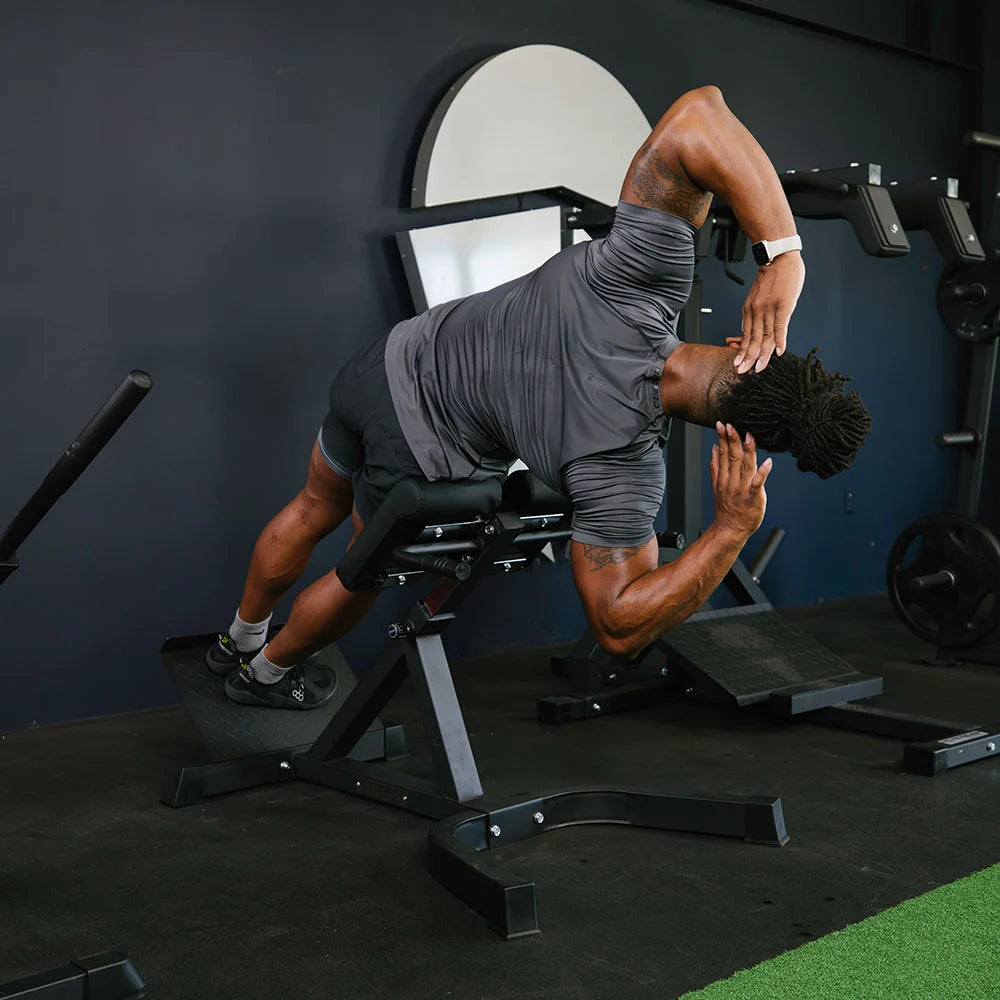 Roman chair back hyperextension machine, rotational hyperextension