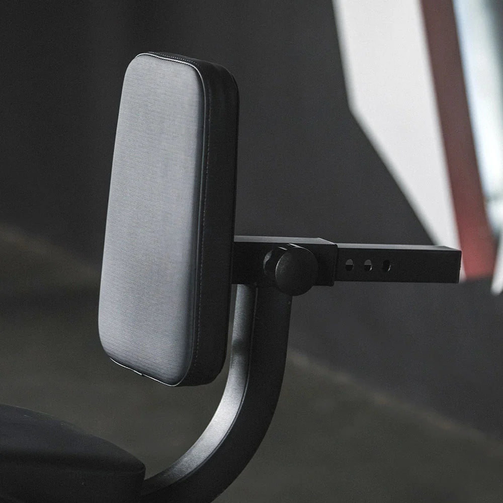 Titan plate-loaded leg extension and leg curl machine, back pad